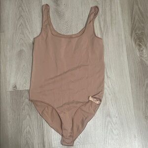 SKIMS Bodysuit in Warm Tan